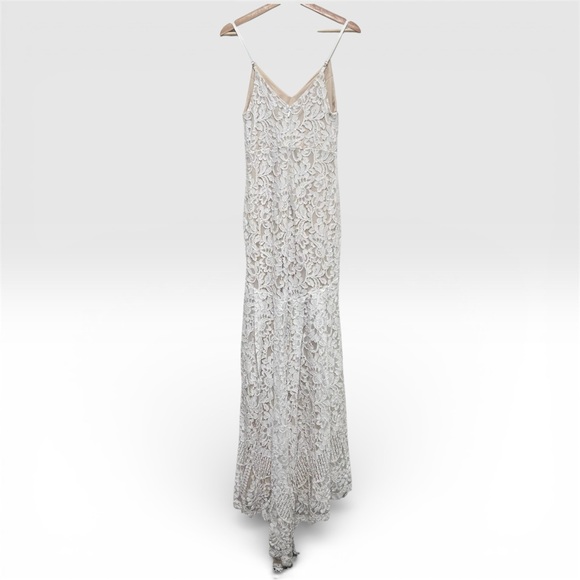 high low mini dress ARI TULLE RUFFLE HIGH LOW MINI DRESS IN BLUSH  AKIRA
